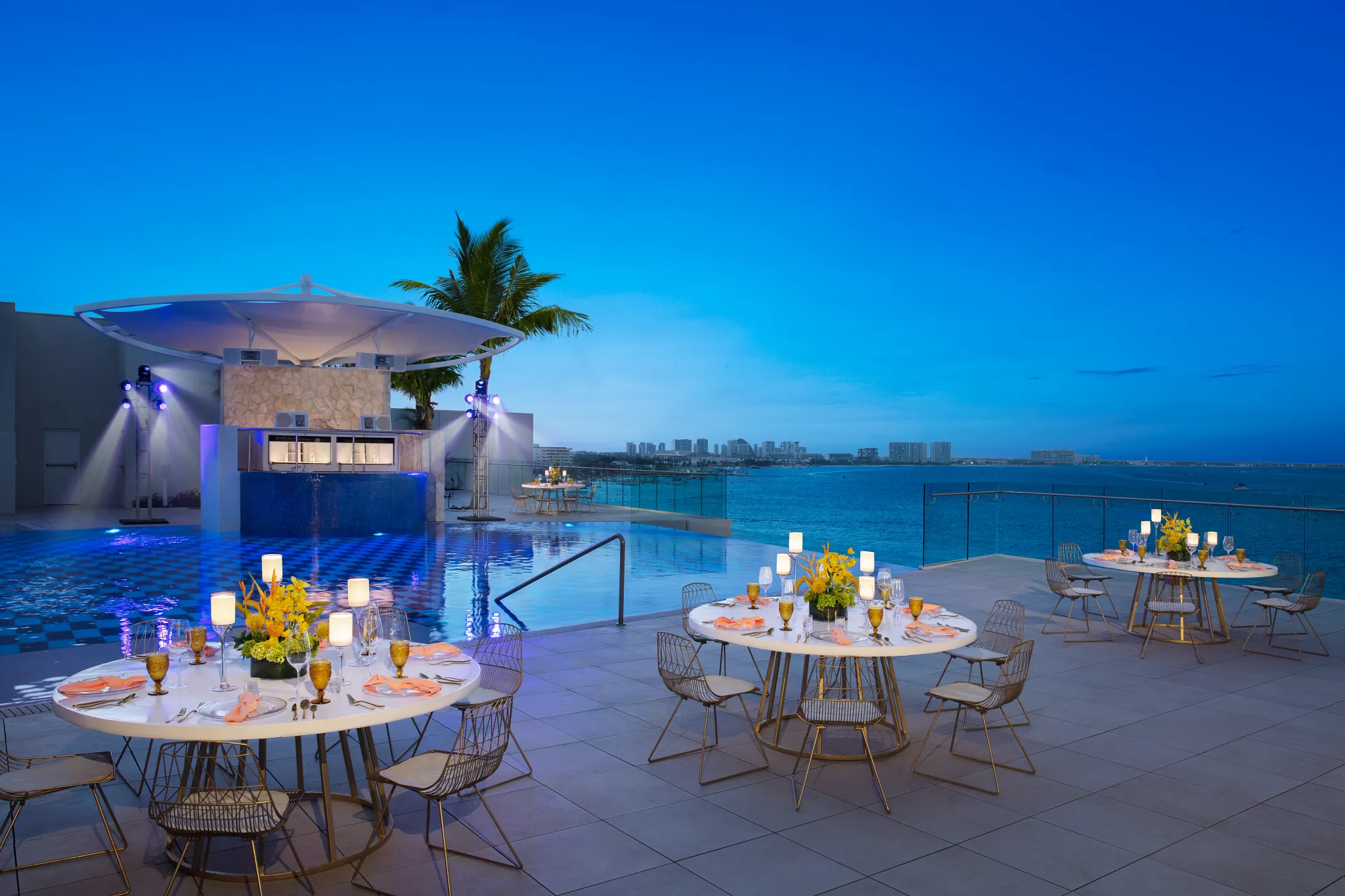 Xcelerate Pool banquet setup for wedding receptions at Breathless Cancun Soul