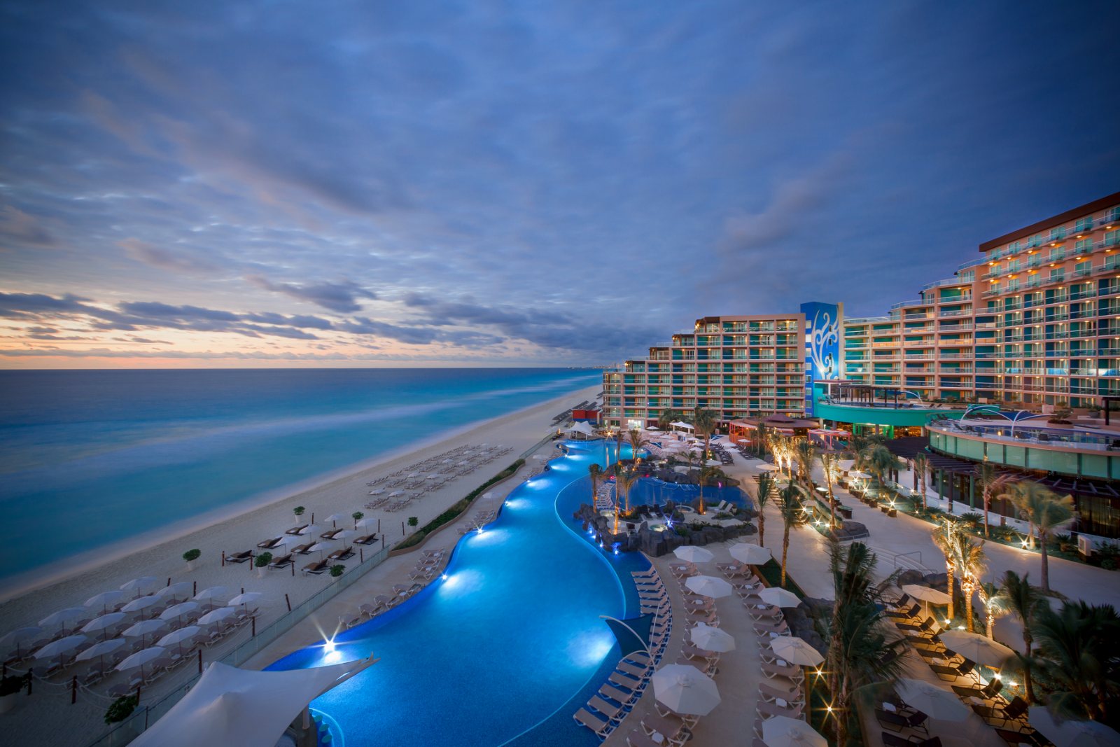 Hard Rock Hotel Cancun all-inclusive beachfront resort with lively pool scene and ocean views in Cancun Hotel Zone.