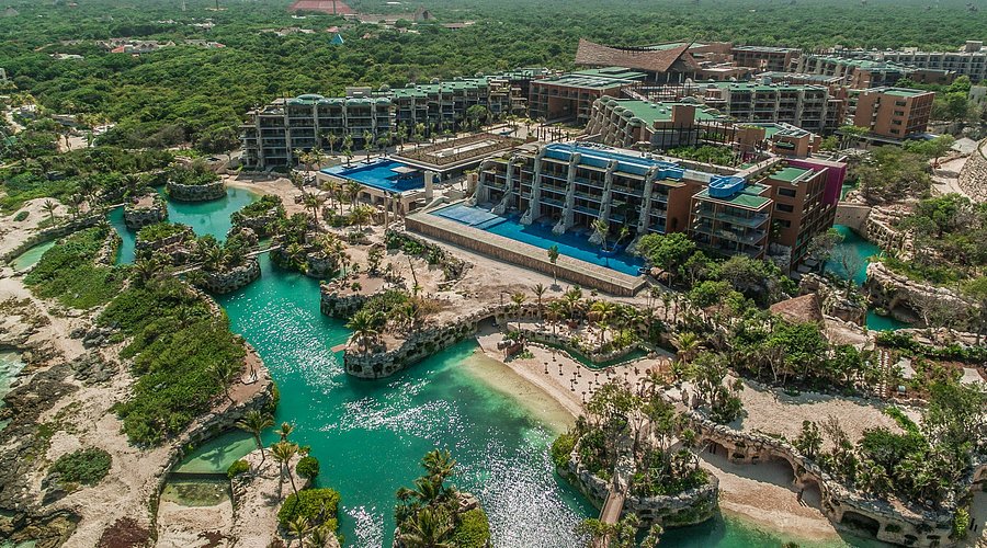 Hotel Xcaret Mexico all-inclusive resort in Riviera Maya with multi-level pools, natural jungle setting, and eco-luxury design near the coast.