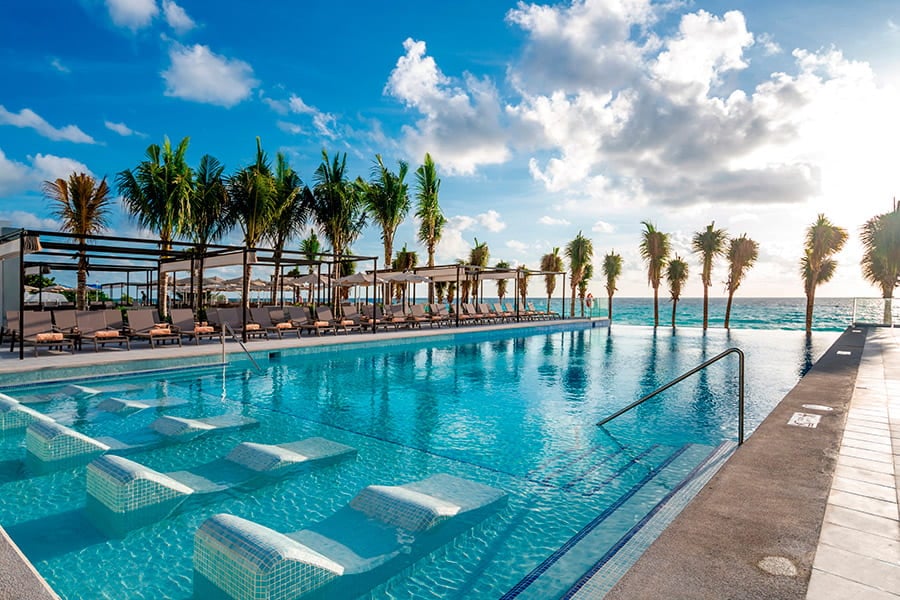 Riu Palace Kukulkan adults-only all-inclusive resort in Cancun’s Hotel Zone with modern beachfront towers, pools, and Caribbean Sea views.